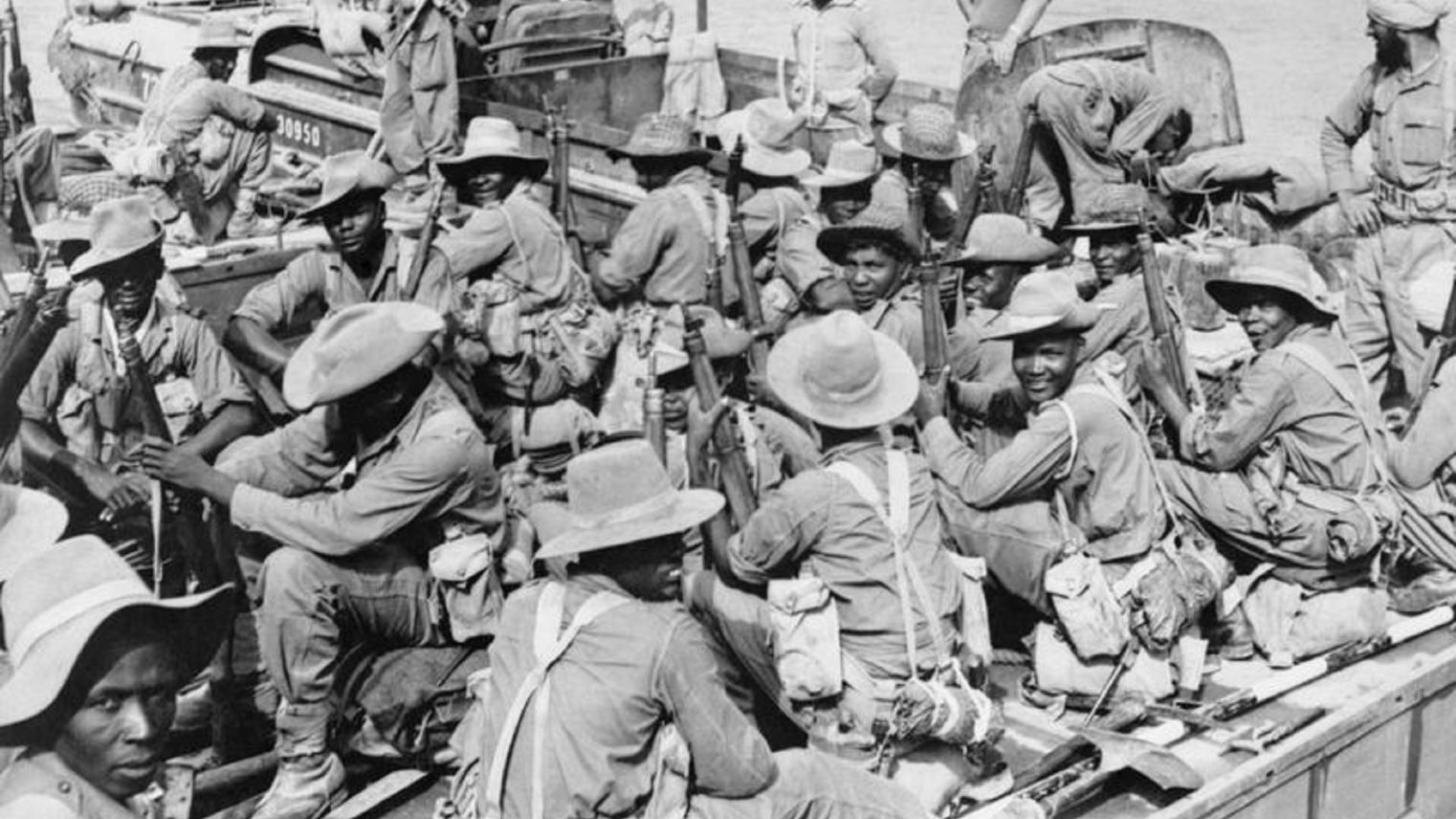 African troops of the 11th East African Division crossing the Chindwin River into Burma in 1944 © IWM SE 923